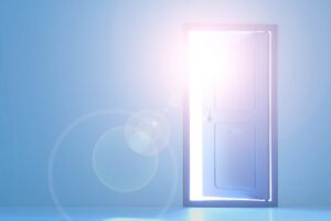 A door opening to radiant light, representing the dawn of a new civilization and human resonance.
